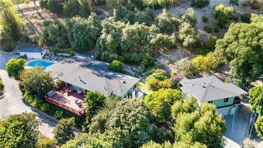 Lifestyle living - two homes, two garages, two driveways, avocado, citrus, pomegranate . Privacy and character galore