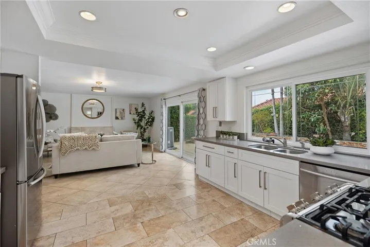 KITCHEN OPEN TO FAMILY ROOM