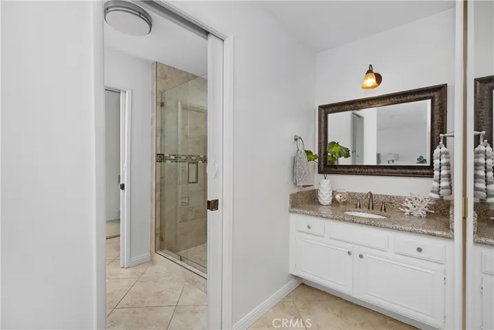 MASTER BATHROOM HIS & HER SIDES