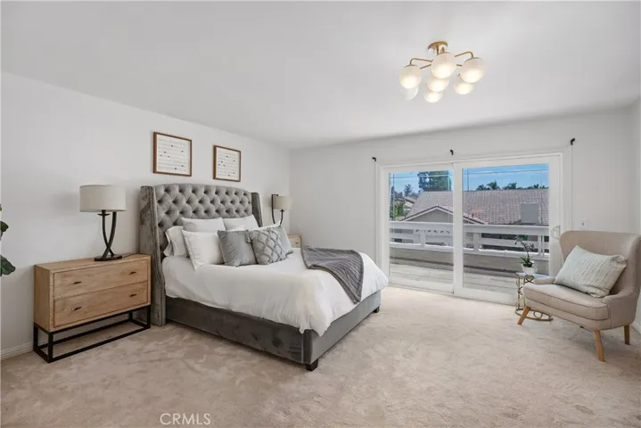 MASTER BEDROOM W/PRIVATE BALCONY