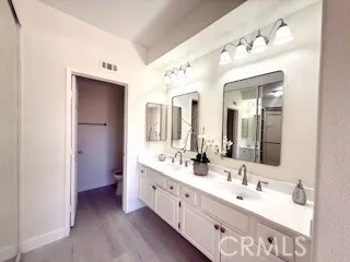 Dual sinks in the primary bathroom.