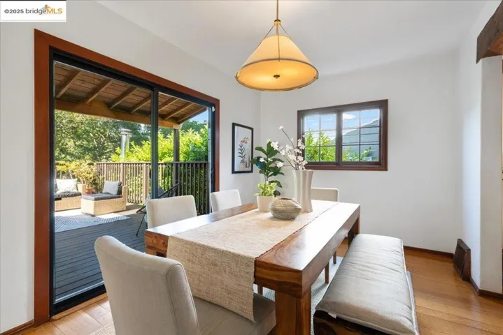 Dining space featuring baseboards and light wood-type flooring