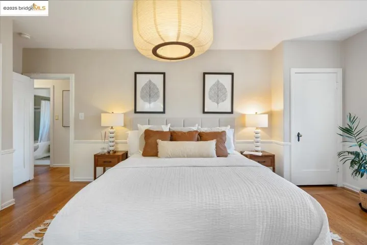 Bedroom with wood finished floors