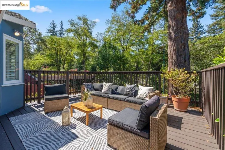Wooden deck featuring an outdoor hangout area