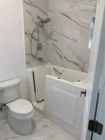 Master 2 bathroom walk in tub and spa American Standard