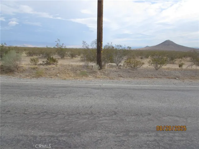 White Poles near power pole on South side of Quarry is approximate middle of PIQ on North side.