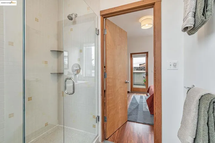 Full bathroom featuring a stall shower