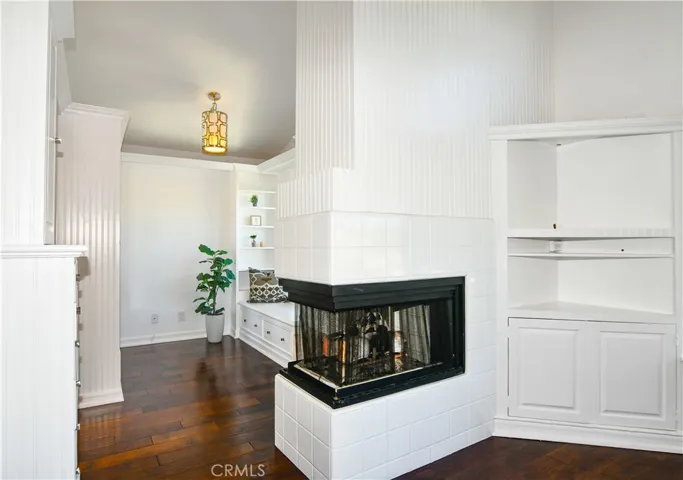 lots of cupboards and storage looking into the dressing area