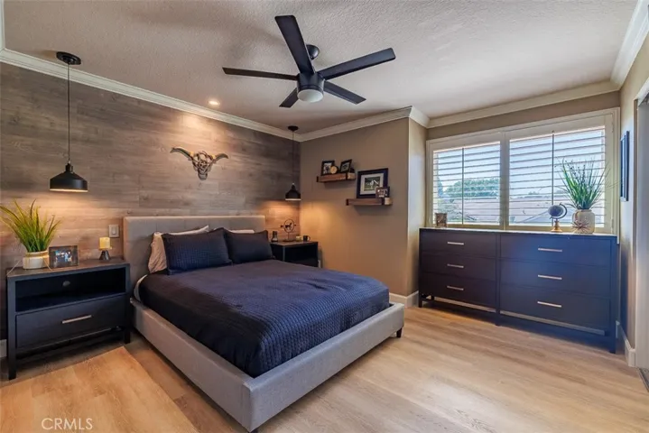 Secondary upstairs bedroom directly across from the primary suite