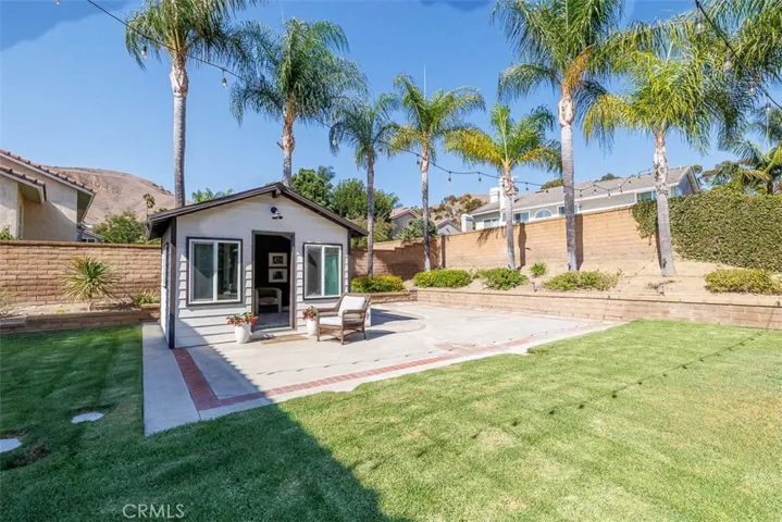 View of the backyard and "The Retreat", with it's own patio