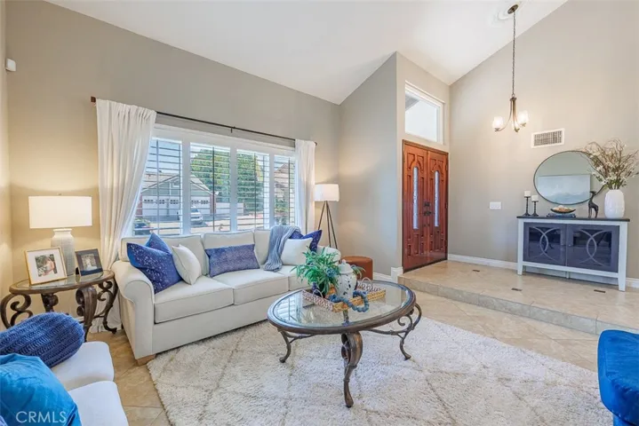 Note the step down into the living room from the formal entry