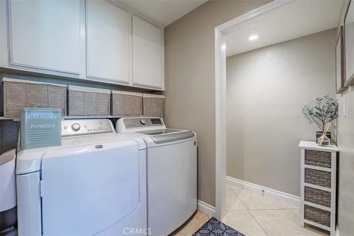 Separate indoor laundry room is just off the family room/main entry. Door way leads into the garage
