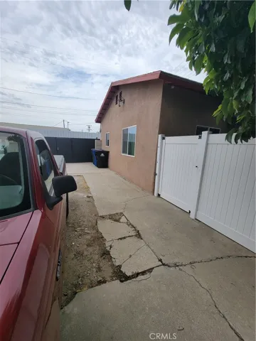 concrete driveway with alley access