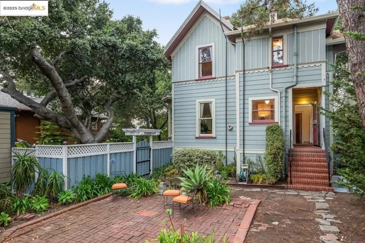 Rear view of property featuring board and batten siding and a patio area