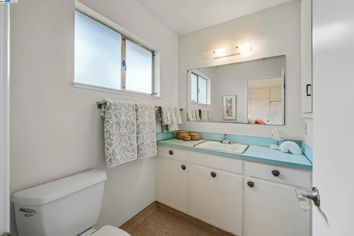 Full bathroom with sink and full shower.