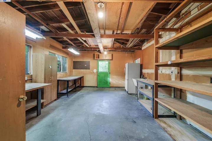 Workshop connected to the garage for the handyman, or use as a playroom, hobby room, or convert to a 3-car garage.