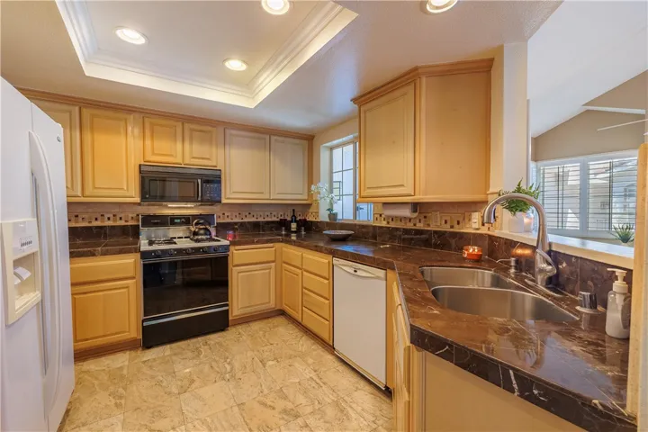 Large Chefs Kitchen with gas range for cooking! Beautiful remodel and cabinets!