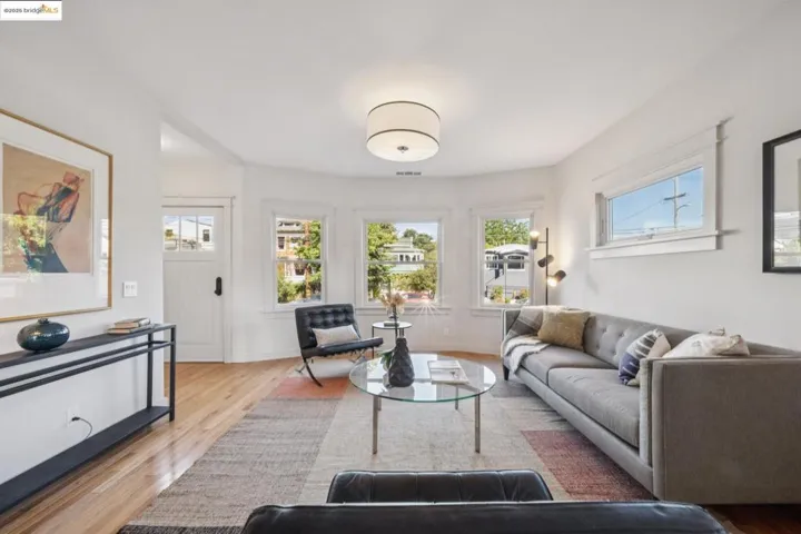 Living room featuring wood finished floors and baseboards