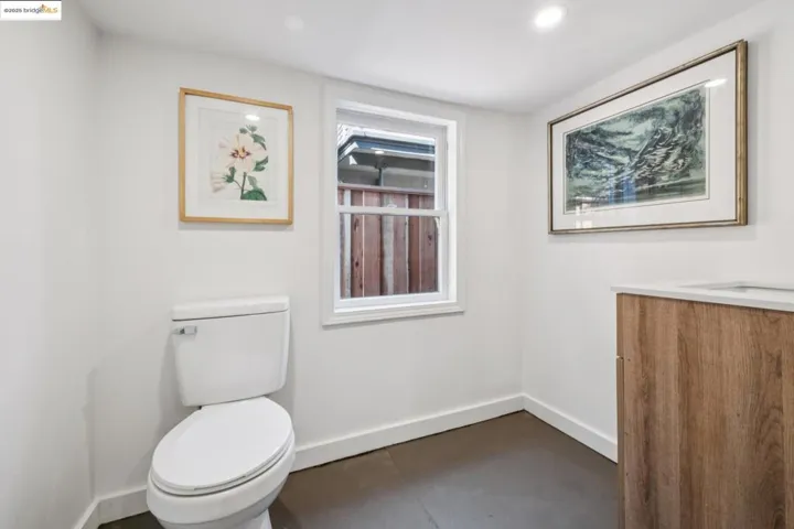 Half bath with vanity and recessed lighting