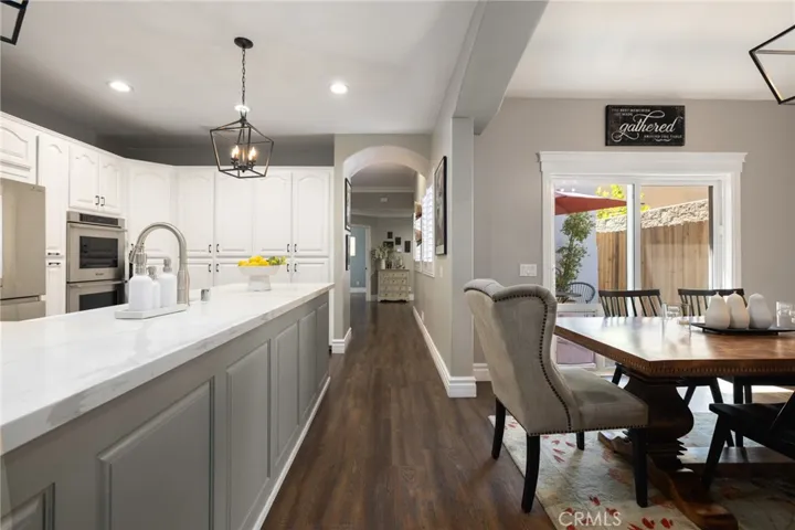 Access to the formal living room, main floor bedroom and laundry room