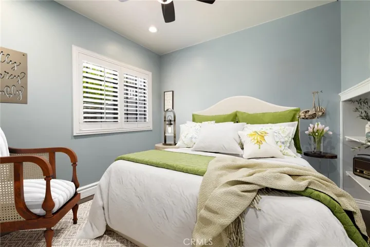 Main floor bedroom/1st secondary bedroom *Virtually staged*