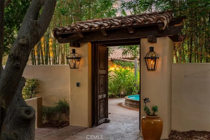 Double doors open to courtyard and front of home
