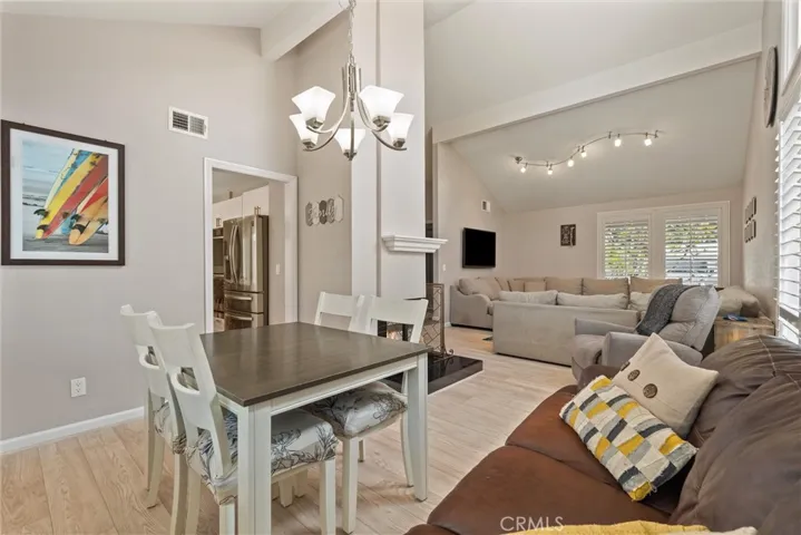 Dining area looking towards living area and kitchen doorway.