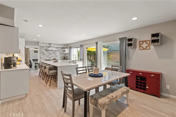 Kitchen and additional versatile kitchen dining/office space.