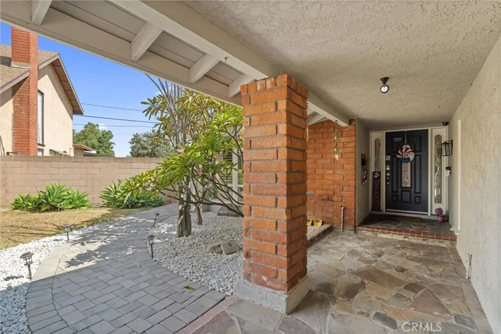 Front walkway to stylish front door.