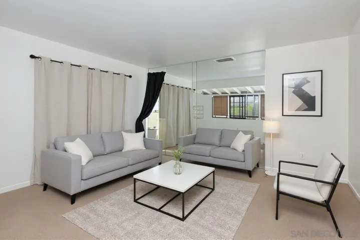 Upstairs unit family room - virtual staging