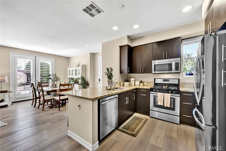 Volume ceilings with recessed lighting