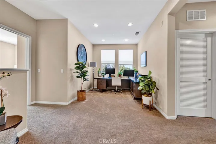 Extra large loft that can be used as office, children's homework room, or a family room