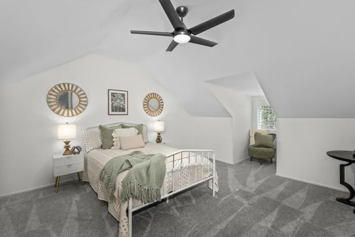 One of the two rooms located upstairs that can be used as a bedroom, office, gym or retreat.