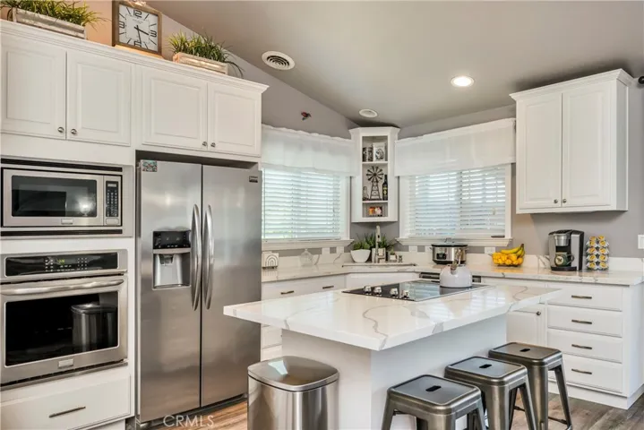 Remodeled kitchen with quartz counters