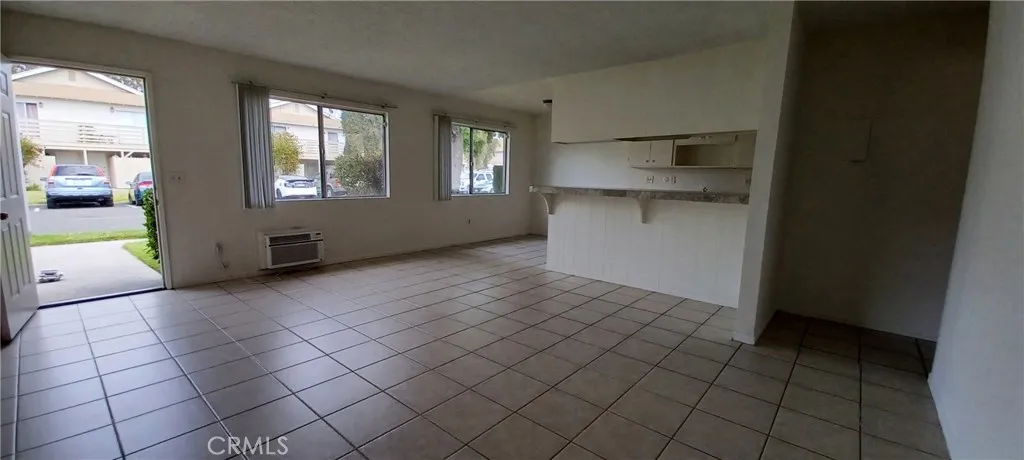Entry living room eating area kitchen