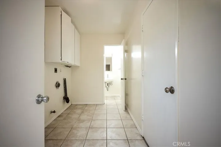 Laundry Room With half bathroom