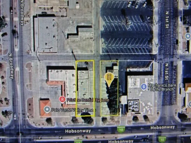 121 E Hobson way and Parking lot between