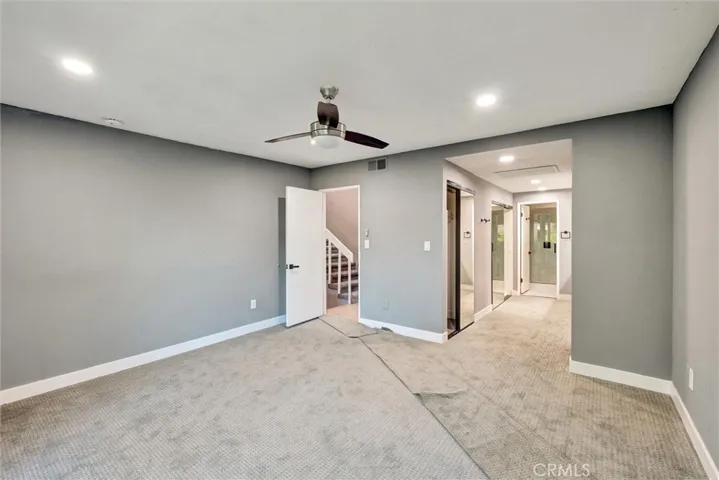ENTRY DOOR, AND PASS TO 3 CLOSETS AND BATH