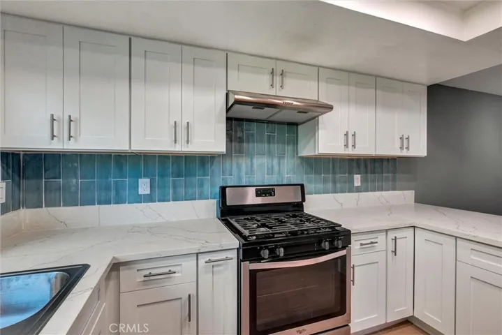 NEW CABINETS, AND BACKSPLASH,