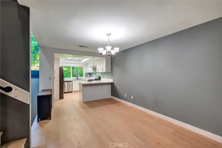 LARGE DINING LOOKING TOWARDS KITCHEN