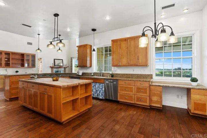 Butcher block Island, built-in desk, all with view.