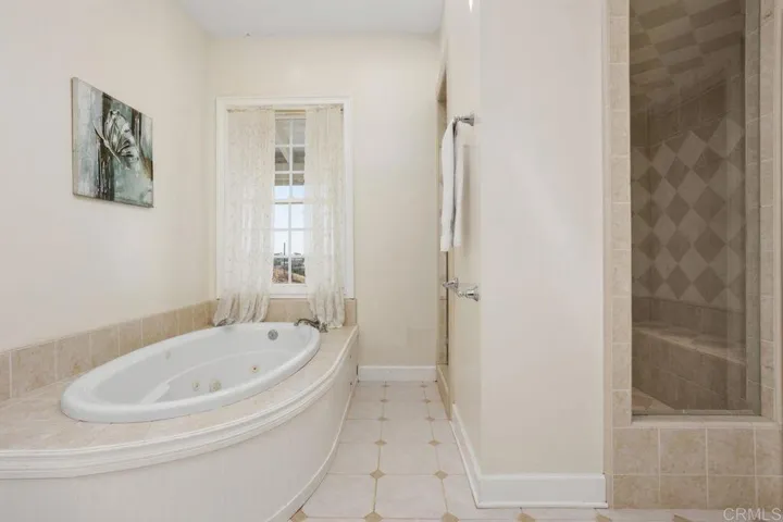 Jetted tub & walk in shower.