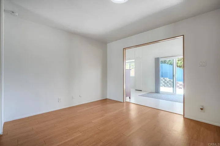 This bedroom is open to the primary- perfect for an office, craft room, work out room or den!