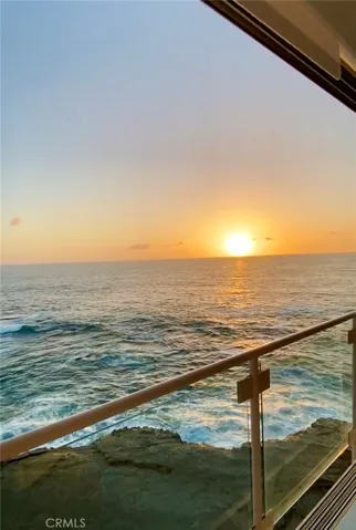Main bedroom with sunset views over the ocean