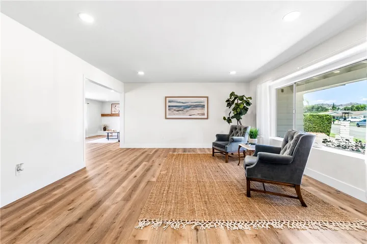 Living Room is open to the family room and dining area