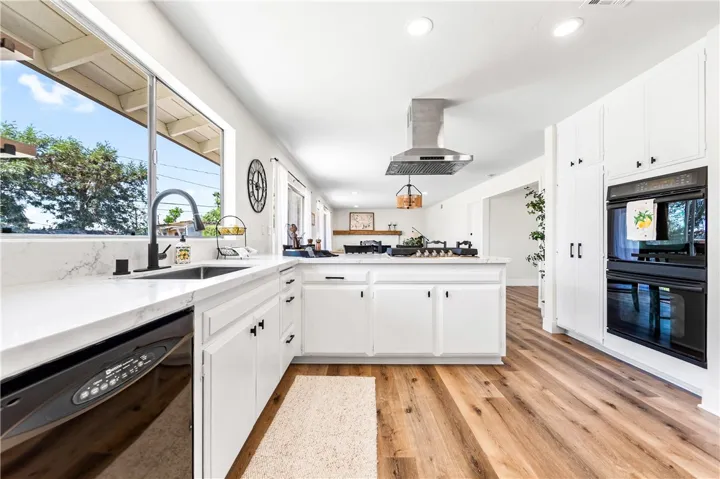 West facing windows allow panoramic sunset view from the Kitchen.