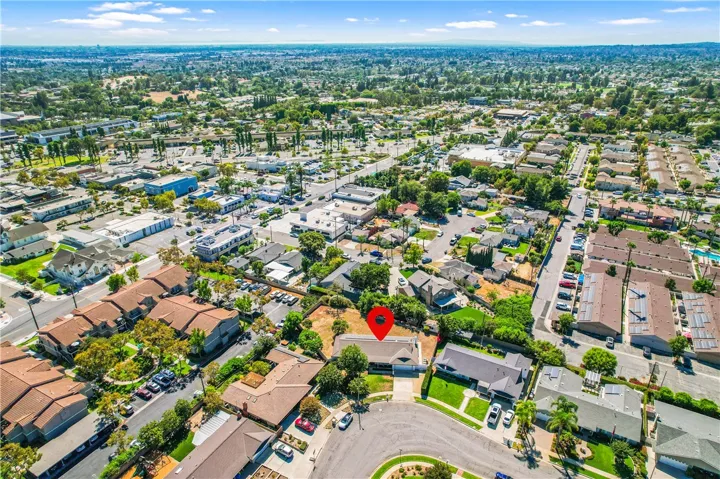 Beautifully positioned on the curve of a quiet 31-home square, the house is setback and angled to maximize privacy. The lot is huge! 17,608 Sq.Ft.