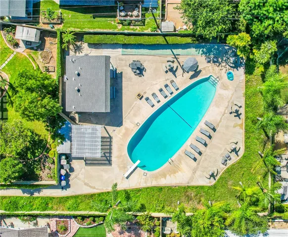 he community pool is located in the center of the enclave of homes.