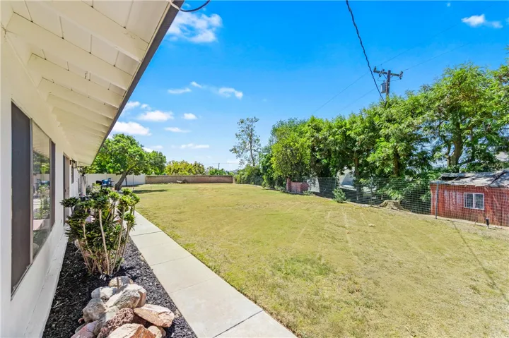 17,608 sq ft Lot with two outbuildings and plenty of space to expand, build an ADU, or enjoy the luxury of serene open space.