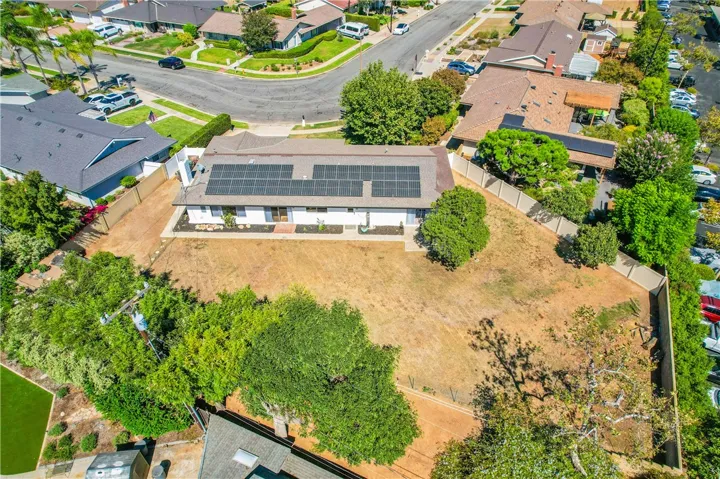 Beautifully positioned on the corner of a quiet 31-home square, the house is setback and angled to maximize privacy. The lot is 17,608 Sq.Ft.